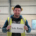 Construction Safety Week 2022 sign held by a worker